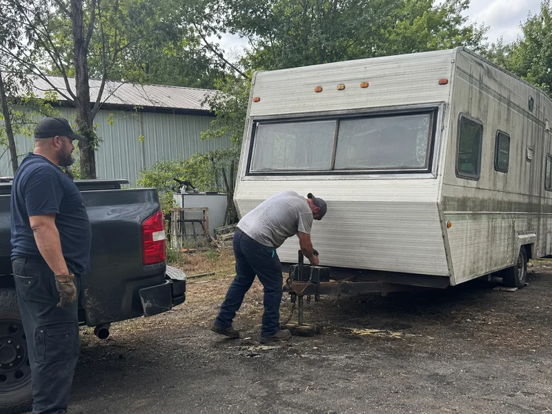 RV removal contractor preparing a camper for Trash My Junk contractor opportunities in Anna, Texas